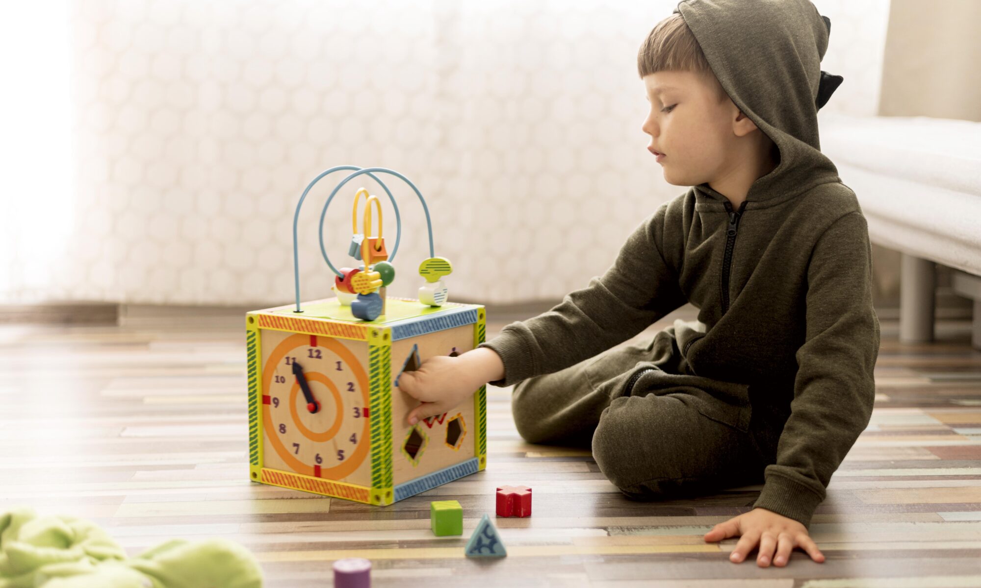 Full Shot Kid Playing With Box | Play and Dream Toys UAE