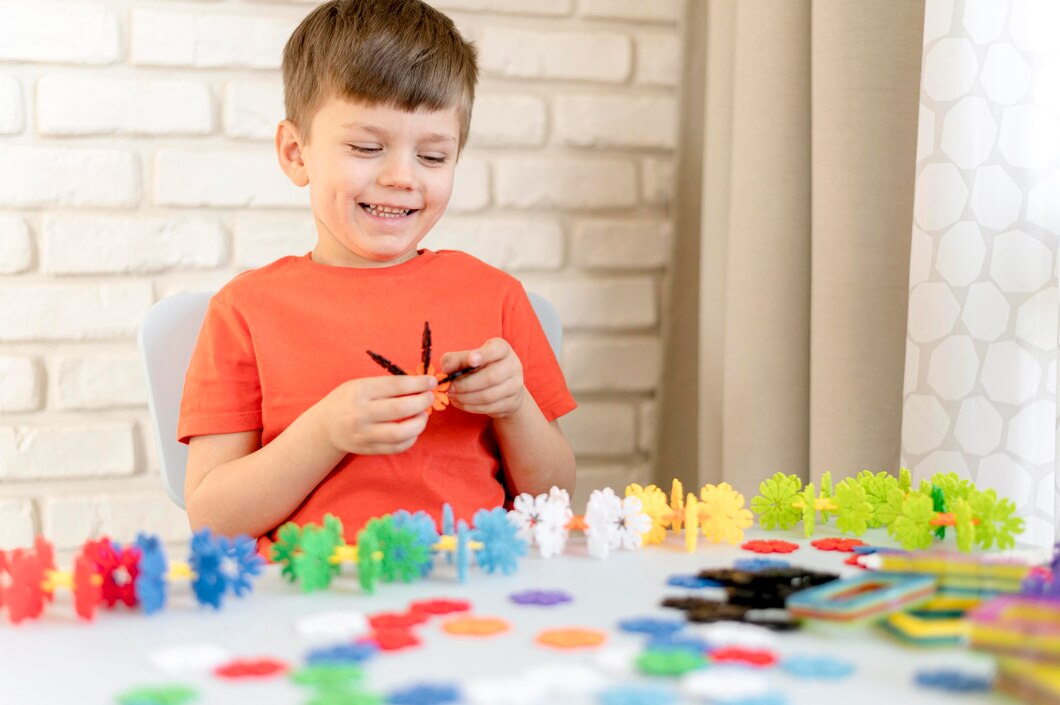 Happy Kid With Plastic Toy | Play and Dream Toys UAE
