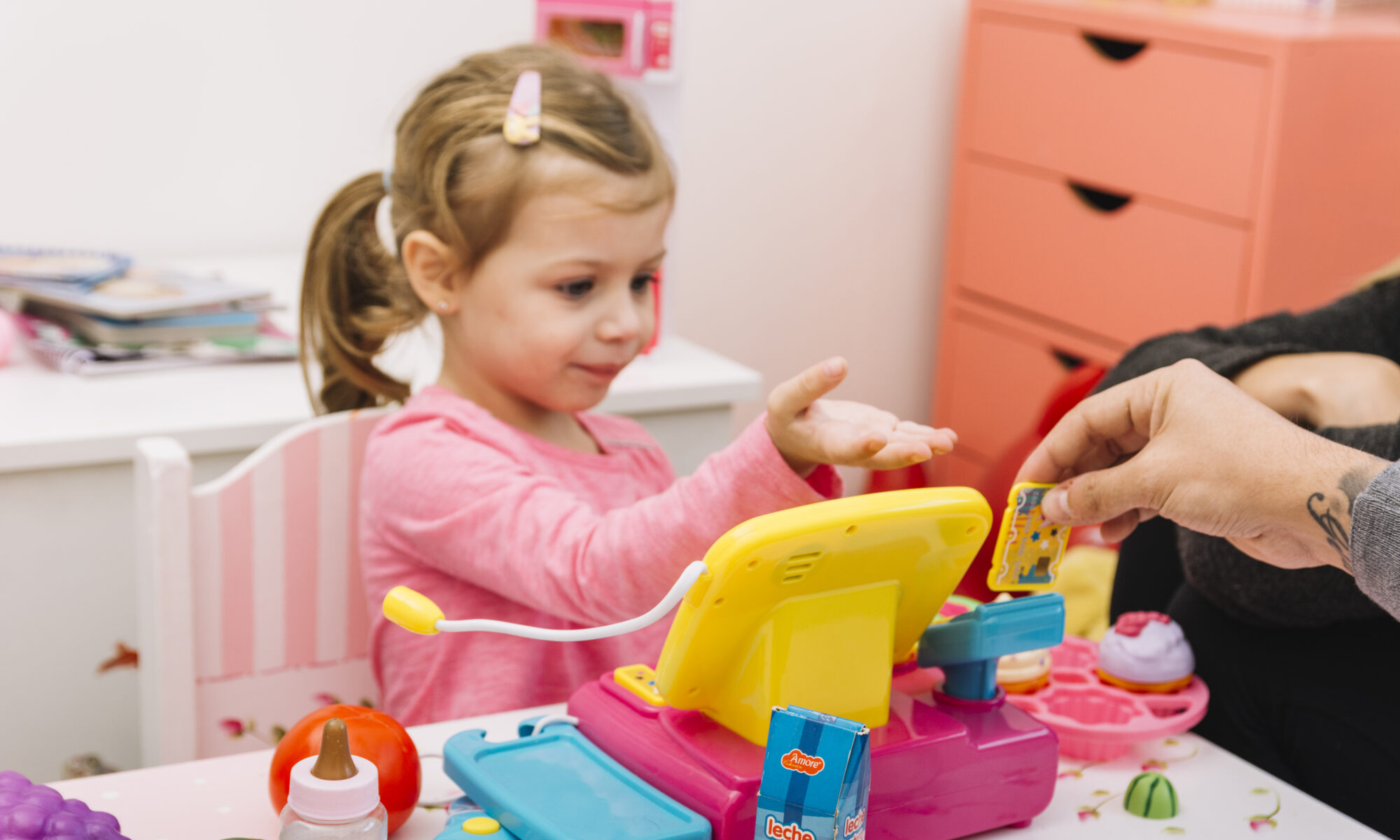 Man Assisting His Daughter While Playing With Toy | Play and Dream Toys UAE
