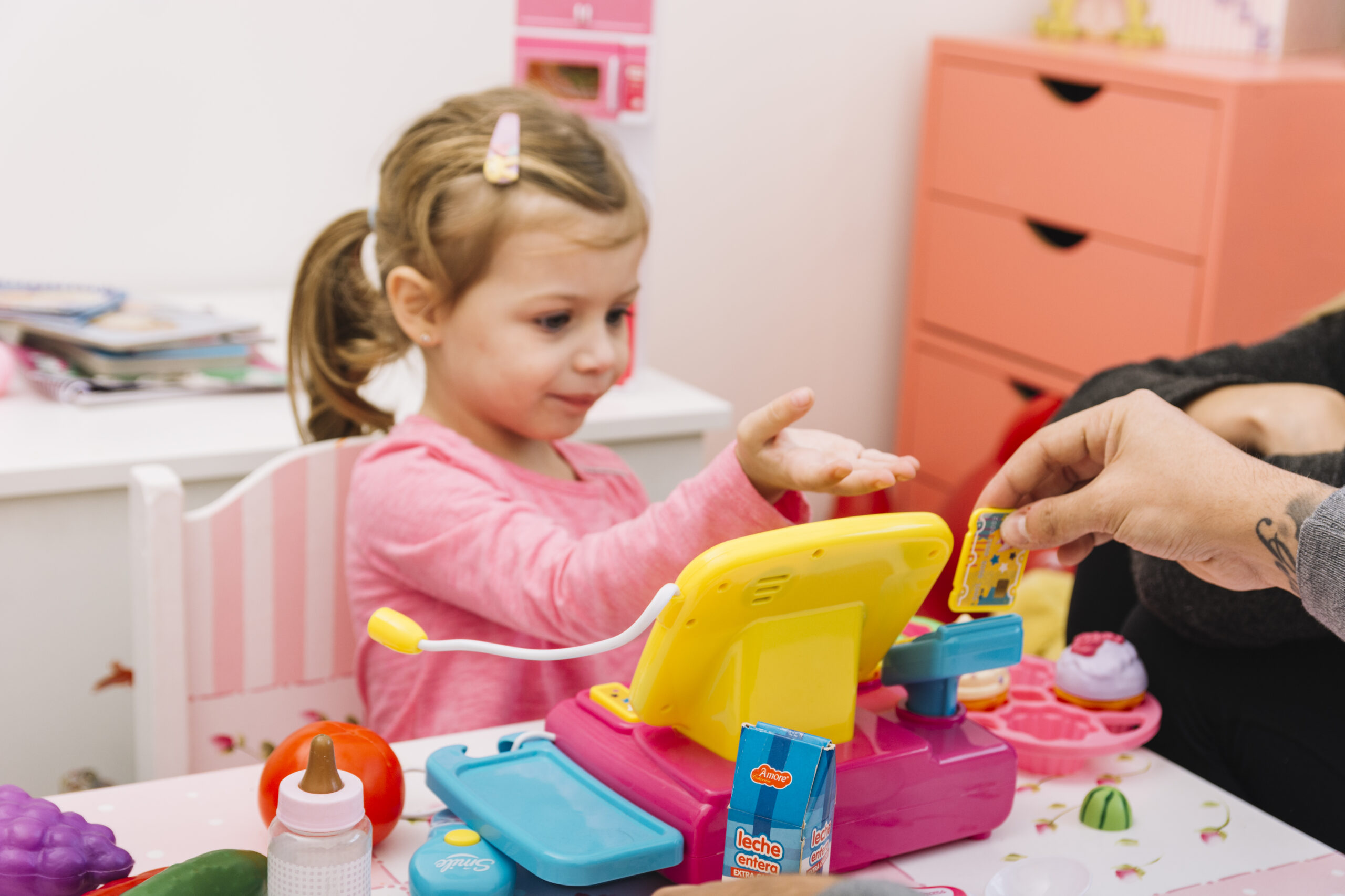 Man Assisting His Daughter While Playing With Toy | Play and Dream Toys UAE