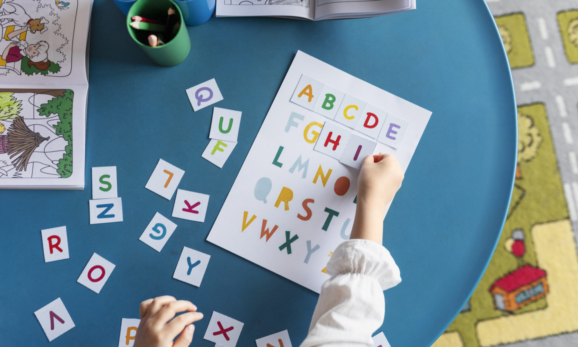 Top View Kid Learning Letters Kindergarten | Play and Dream Toys UAE
