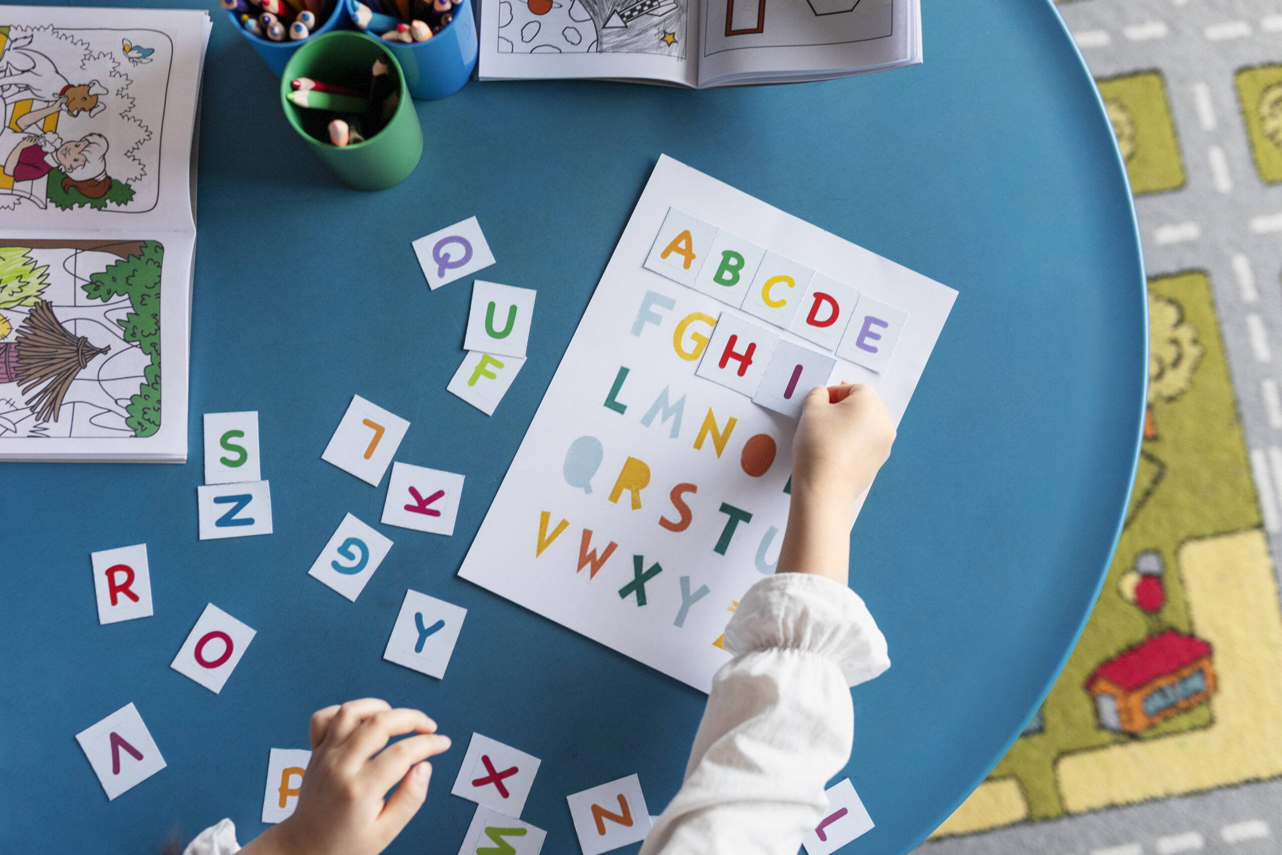 Top View Kid Learning Letters Kindergarten | Play and Dream Toys UAE
